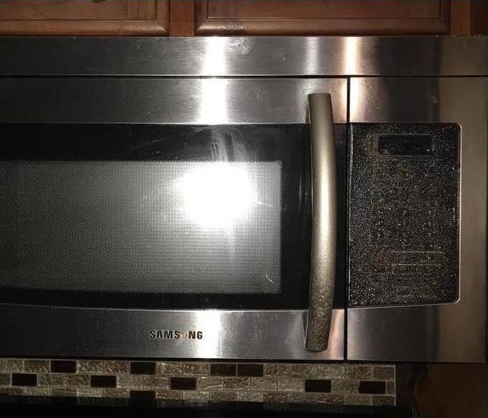 damage to appliance after stove caught fire