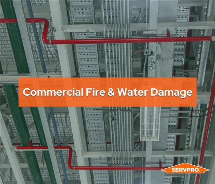 commercial sprinkler system in a business warehouse, ceiling, red pipes for water